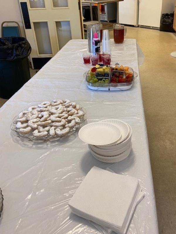 Almond cookies, fruit and jello (for our gluten free attendees) and refreshing iced tea are arranged in anticipation of hungry retreat attendees.